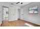Bright bedroom features wood flooring, closet and natural light creating a comfortable and functional space at 3397 Janet St, Apopka, FL 32712