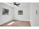 Bright bedroom with modern ceiling fan and natural light creates a peaceful and airy ambiance at 3397 Janet St, Apopka, FL 32712