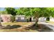 Charming single-story home with fresh exterior paint, landscaped front yard, and mature tree at 3397 Janet St, Apopka, FL 32712