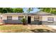 Charming single-story home with fresh exterior paint and manicured landscaping at 3397 Janet St, Apopka, FL 32712