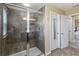 Bathroom featuring a tiled walk-in shower with a bench, two doors and tile flooring at 3883 Crawley Down Loop, Sanford, FL 32773