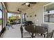 An outdoor patio featuring multiple ceiling fans and full outdoor kitchen set up at 3883 Crawley Down Loop, Sanford, FL 32773