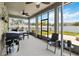 Spacious screened-in patio offers an outdoor living area with views of the green backyard at 3883 Crawley Down Loop, Sanford, FL 32773