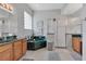 Main bathroom features a soaking tub, tiled shower, vanity, and great lighting at 4221 Kezar Ct, Belle Isle, FL 32812