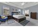 Spacious main bedroom includes neutral wall color, soft carpet, and access to the bathroom at 4221 Kezar Ct, Belle Isle, FL 32812