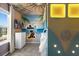 Themed bedroom with surfboard, beach mural, bunk beds, and VW bus facade at 4310 Lana Ave, Davenport, FL 33897
