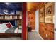 Whimsical Harry Potter themed bedroom features bunk beds, brick accent wall and creative decor at 4310 Lana Ave, Davenport, FL 33897