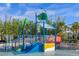 Colorful splash pad with slides and water features provides fun for all ages at 4310 Lana Ave, Davenport, FL 33897