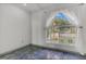 Bright bedroom features a large window offering natural light and street views at 485 Whittingham Pl, Lake Mary, FL 32746