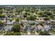 Aerial view of the neighborhood showcasing tree-lined streets and well-maintained homes at 485 Whittingham Pl, Lake Mary, FL 32746