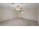 Bedroom featuring carpet, ceiling fan, and neutral paint at 4895 Cr 134B, Wildwood, FL 34785