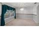 Comfortable dining room with carpet, window, and attractive chandelier, perfect for Gathering meals and entertaining guests at 4895 Cr 134B, Wildwood, FL 34785