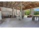 Spacious garage featuring an open layout, high ceilings, and multiple bays for versatile usage at 4895 Cr 134B, Wildwood, FL 34785