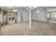 Large living space with vaulted ceilings, multiple windows, and an open floor plan with ample room for entertaining at 4895 Cr 134B, Wildwood, FL 34785