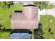 This aerial image shows a home with well-kept lawn and mature trees, providing a private and picturesque residential environment at 5216 Sunrise Blvd, Orlando, FL 32803