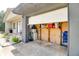 Attached garage partially filled with storage items; access to front yard at 5216 Sunrise Blvd, Orlando, FL 32803