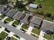 Aerial view of the home in a community with an outlined property line at 5350 Pine Lilly Dr, St Cloud, FL 34771