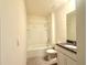 Clean bathroom featuring a tub/shower combo and single sink vanity with a granite countertop at 5350 Pine Lilly Dr, St Cloud, FL 34771