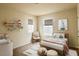 Cozy bedroom featuring a double window and plenty of room to relax at 5350 Pine Lilly Dr, St Cloud, FL 34771