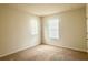 Bedroom featuring carpet and natural light from the window at 5350 Pine Lilly Dr, St Cloud, FL 34771
