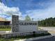 Elegant stone signage welcomes you to Glenwood, showcasing a beautiful community entrance at 5350 Pine Lilly Dr, St Cloud, FL 34771