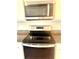 Close up of kitchen appliance: Whirlpool microwave and oven at 5350 Pine Lilly Dr, St Cloud, FL 34771