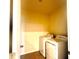 Convenient laundry room with a side-by-side washer and dryer at 5350 Pine Lilly Dr, St Cloud, FL 34771