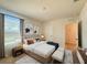 Spacious main bedroom suite with a large window allowing plenty of natural light at 5350 Pine Lilly Dr, St Cloud, FL 34771