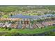Stunning aerial view of this home's location, featuring serene water and lush landscapes, perfect for relaxation at 636 Grand Canal Dr, Kissimmee, FL 34759