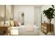 Bright bedroom featuring a closet and view to another room. Natural light fills the space at 773 Tundra Loop, Groveland, FL 34736