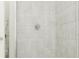 Modern shower featuring elegant, large, light-grey tiling and sleek fixtures at 773 Tundra Loop, Groveland, FL 34736