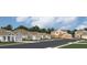 Charming street view showcases beautiful homes and well-manicured lawns at 773 Tundra Loop, Groveland, FL 34736