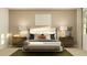 Charming bedroom with natural light, complemented by stylish nightstands and elegant lamps for a cozy atmosphere at 809 Tundra Loop, Groveland, FL 34736