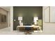 A modern home office with olive-green accent wall, a white desk, and stylish decor at 809 Tundra Loop, Groveland, FL 34736