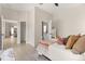 Bright bedroom showcases ensuite bathroom and closet access for convenience at 811 E Mcdonald Ave, Eustis, FL 32726