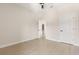 Clean bedroom with a ceiling fan, white trim, wood floor, and white doors leading to other rooms at 811 E Mcdonald Ave, Eustis, FL 32726