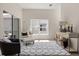 Bright living room features a chaise lounge, modern decor, and ample natural light at 811 E Mcdonald Ave, Eustis, FL 32726