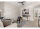 Bright living room with a modern fireplace, neutral colors, and contemporary decor at 811 E Mcdonald Ave, Eustis, FL 32726