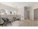 Comfortable loft area with seating, bright windows, and wood flooring perfect for relaxation and a reading nook at 811 E Mcdonald Ave, Eustis, FL 32726
