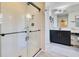 Modern bathroom featuring a glass shower, vanity and tile flooring at 8256 Bayview Crossing Dr, Winter Garden, FL 34787