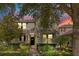 Beautiful two-story home with lush landscaping, stone accents, and inviting front entrance at 8256 Bayview Crossing Dr, Winter Garden, FL 34787