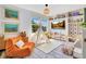 Bright playroom features decor, large windows, and cozy furniture to create an enjoyable space at 8256 Bayview Crossing Dr, Winter Garden, FL 34787