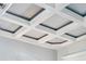 Close up of a coffered ceiling adding architectural detail to the room at 8612 Summerville Pl, Orlando, FL 32819