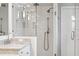 Modern shower with white subway tiles and bronze fixtures at 8612 Summerville Pl, Orlando, FL 32819