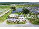 Community showcasing various amenities, pool, shuffleboard, clubhouse, and parking at 6231 Atkinson Ln, The Villages, FL 32163