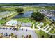 Overhead shot of community amenities, including a pool, clubhouse, and shuffleboard at 6231 Atkinson Ln, The Villages, FL 32163
