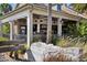 Outdoor bar and seating area at restaurant offers open-air dining and drinks at 6231 Atkinson Ln, The Villages, FL 32163