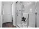 Bathroom featuring a glass door shower with tile surround, and chrome shower head at 6231 Atkinson Ln, The Villages, FL 32163