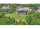 Lovely screened pool home with expansive yard and mature landscaping for your outdoor pleasure at 1017 Parkside Pointe Blvd, Apopka, FL 32712