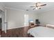 Bedroom featuring hardwood floors, a ceiling fan, and neutral paint at 103 Odin Dr, Winter Haven, FL 33884